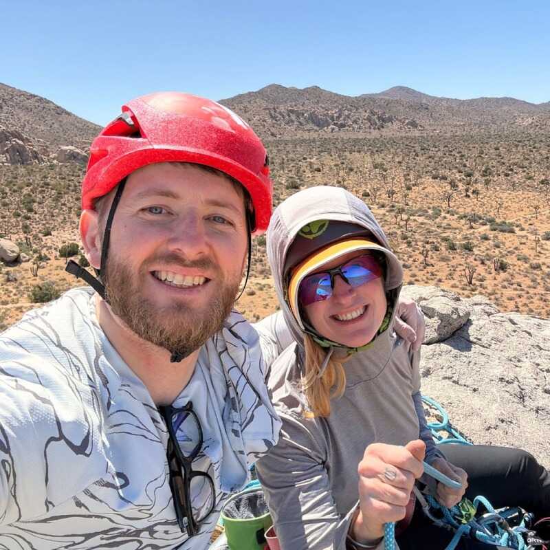 Max Goshay, founder of Headland, climbing in the desert with his partner